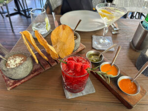 a picture of some drinks and appetizers from Porfirio’s which is one of the 10 best restaurants in Playa del Carmen