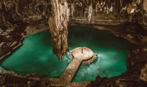 Going to a Cenote (in this picture) is one of the best things to do in Playa del Carmen while visiting